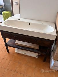 Lavabo con doppio rubinetto