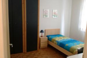 Appart. con due singole - giardino pubblico