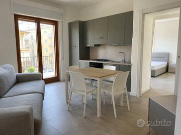 BILOCALE con BALCONE adiacente stazione
