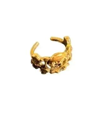 Anello dorato con teschio