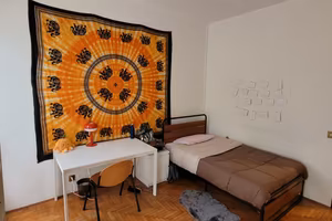 Camere singole in grande appartamento condiviso