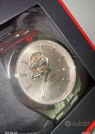 Tissots watch powermatic gentlman openheart