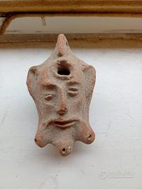 antica lampada ad olio in terracotta 