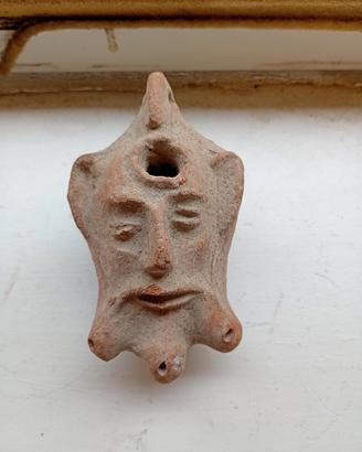 antica lampada ad olio in terracotta 