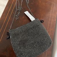 Pochette nera con brillantini stradivarius