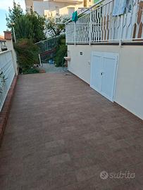 bilocale con giardino e terrazzo