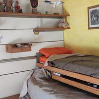 cameretta con letti scorrevoli