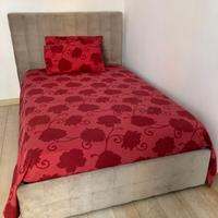 Letto una piazza e mezza con contenitore