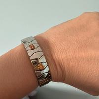 Bracciale acciaio e oro 18 carati
