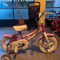 Bicicletta bambina rosa e bianca
