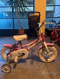 Bicicletta bambina rosa e bianca