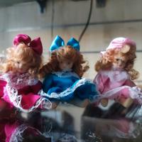 3 Bamboline ceramica con vestiti di stoffa