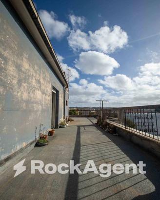 LUMINOSO QUADRILOCALE CON TERRAZZA PANORAMICA