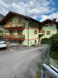 Trilocale arredato + terreno edificabile