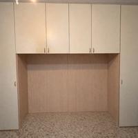 Armadio a ponte matrimoniale con 8 ante