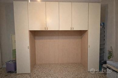 Armadio a ponte matrimoniale con 8 ante