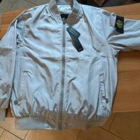 giacca a vento grigia stone island