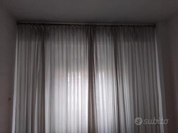 Mantovana in ottone e tende a parete 