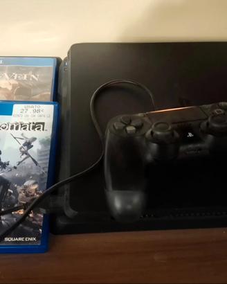 PlayStation 4 con cavi e un controller