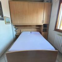 Camera da letto con armadio a ponte