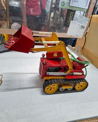 Escavatore gioco in latta 