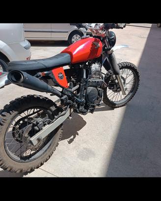  moto  scrambler Honda dominator  bel sound.g