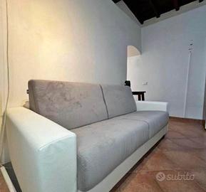 Divano letto a ribalta bianco/grigio