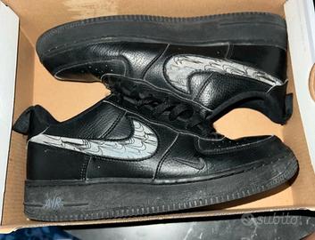 AIR FORCE 1 NERE CON STEMMA NIKE ILLUMINANTE