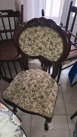 Poltrona in legno con tessuto a fiori