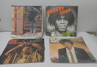 4 Dischi in vinile a 45 giri anni 70/80