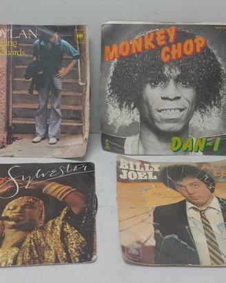 4 Dischi in vinile a 45 giri anni 70/80
