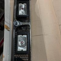 Mascherina con fari lancia delta 530