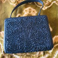 Borsa pochette nera in seta e raso