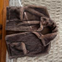 Gilet in finta pelliccia e pelle