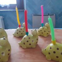 portacandeline a forma di dinosauro