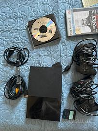 Playstation 2 slim insieme 2controller e giochi