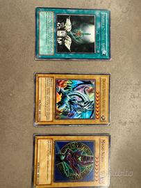 Carte yu gi oh drago bianco mago nero