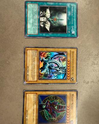 Carte yu gi oh drago bianco mago nero