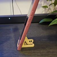 Supporto pieghevole telefono + portachiavi