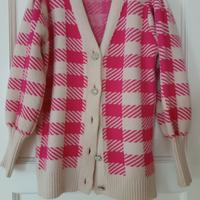 Golfone a quadri bianco e rosa.