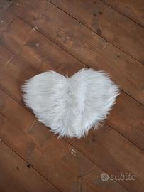 Tappeto bianco a forma di cuore