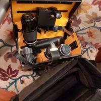 Macchina fotografica Nikkormat con obiettivi e acc