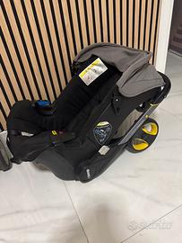 seggiolino/ passegino doona