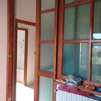 Porta scorrevole in legno