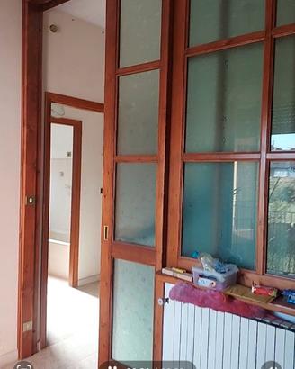 Porta scorrevole in legno