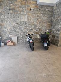 Posto moto in centro con telecomando