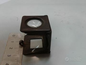 Lente antica piccola apribile a scatto