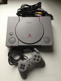 PlayStation 1 + volante con pedaliera + gioco F1