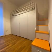 Letto a soppalco con armadio bambino