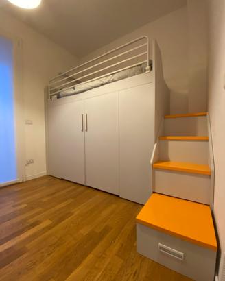 Letto a soppalco con armadio bambino